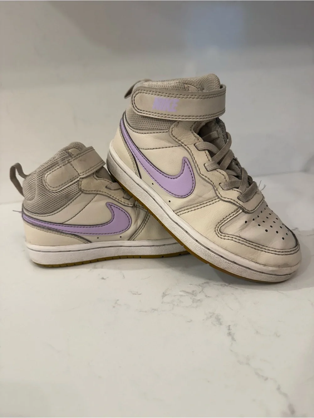 Nike Kids' High-Top Sneakers in White with Lavender Swoosh